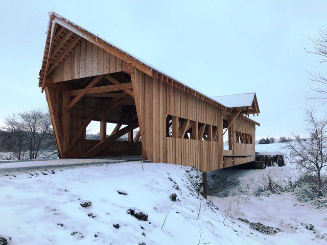 Blue Ridge Timberwrights - Burr Arch Covered Bridge snow covered close up