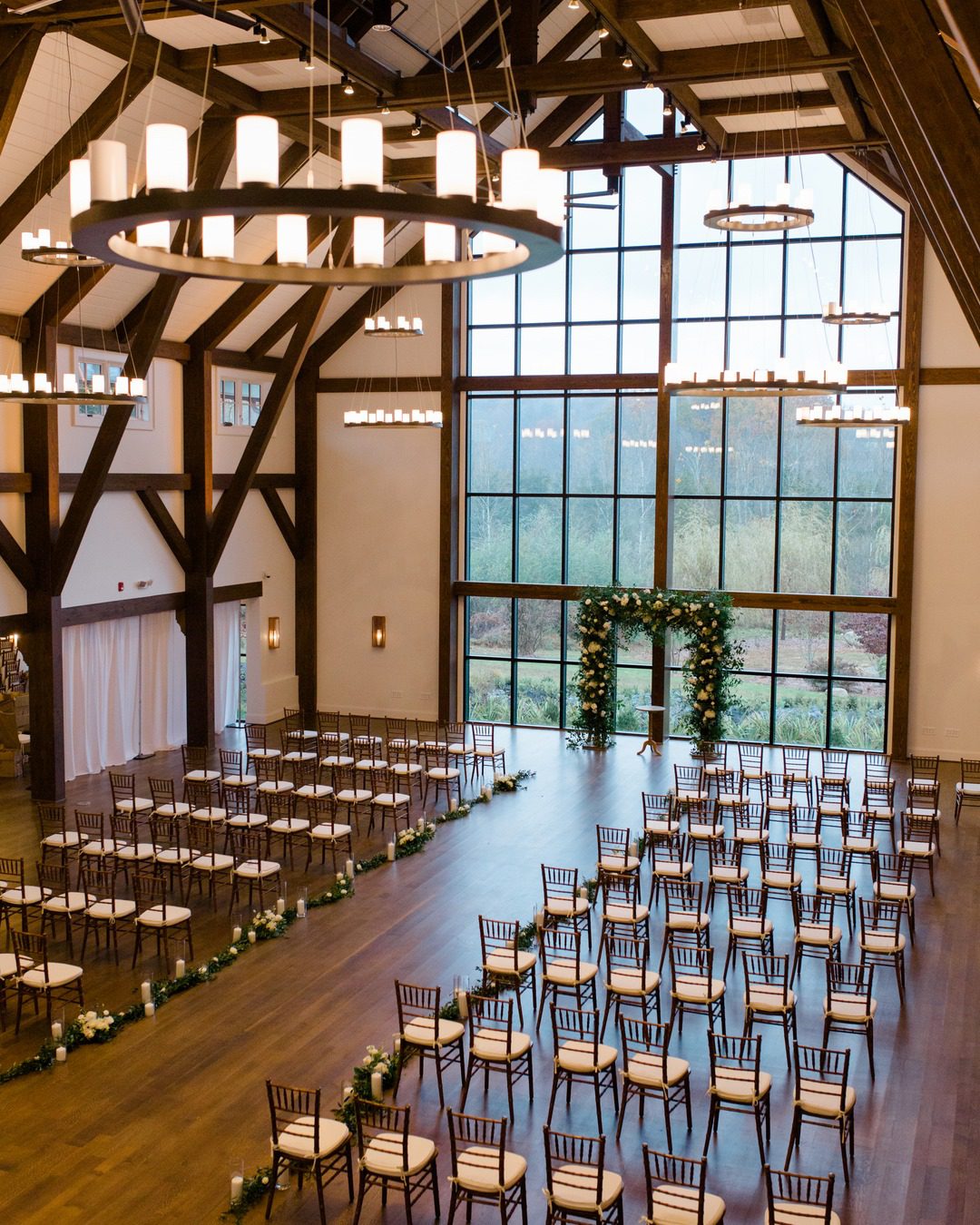Blue Ridge Timberwrights - Crossed Keys Estate main hall with wedding arch and seating for guests