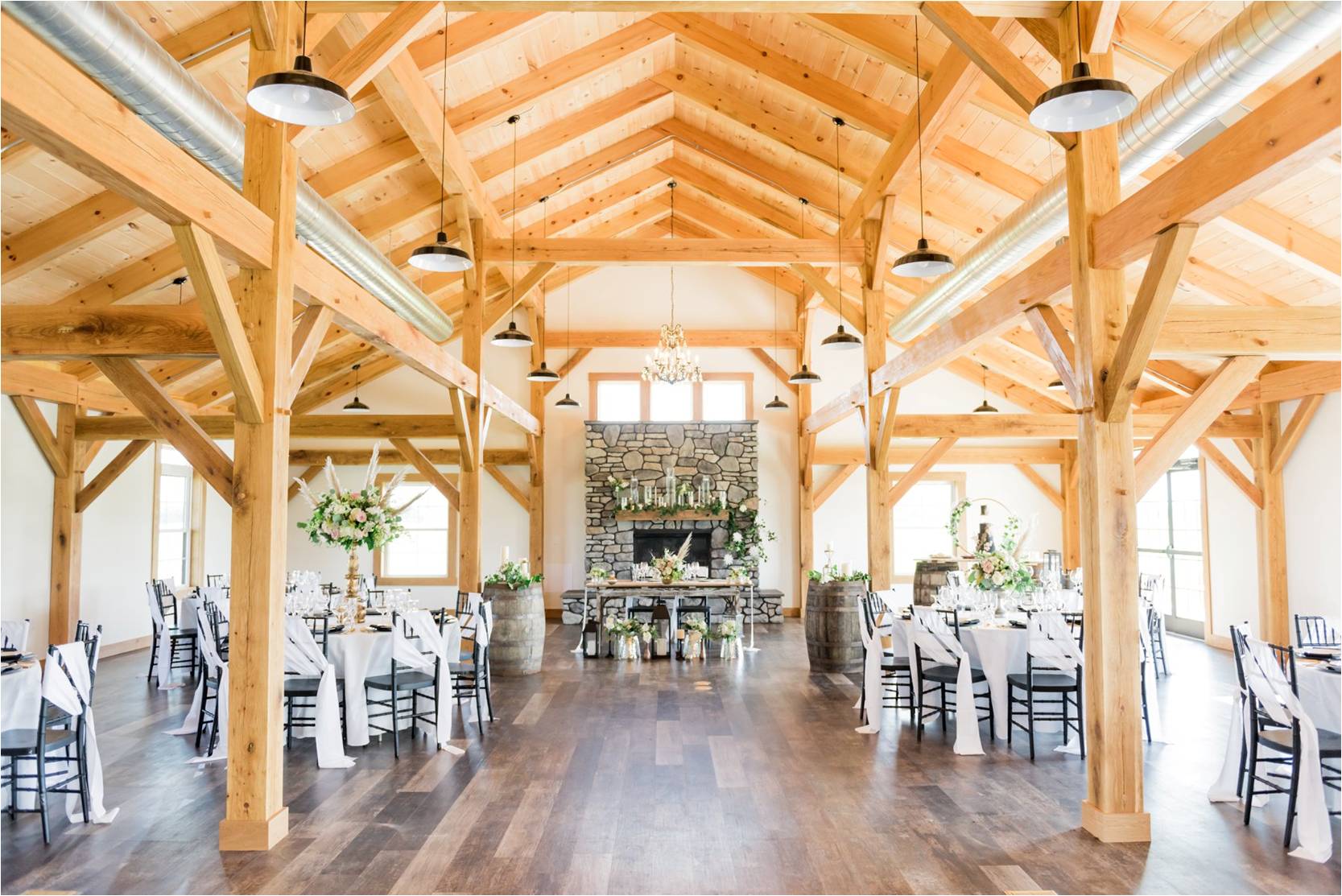 Decorated tables, reception all, fireplace - Fox Meadow Barn at Cloverdale Farm - Blue Ridge Timberwrights