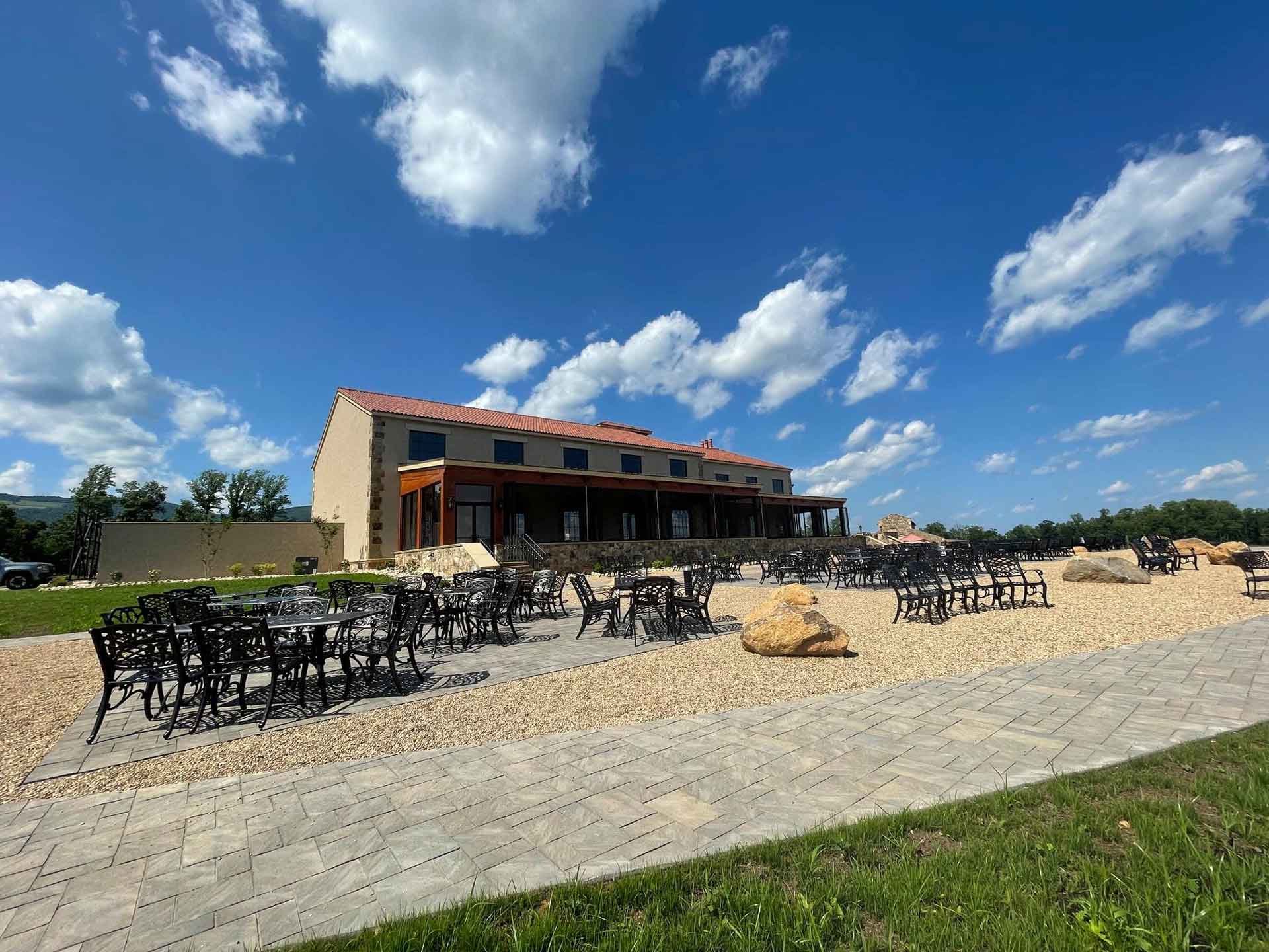 Back of venue with iron seating, timber porch, Hazy Mountain Vineyards - Blue Ridge Timberwrights Event Venues Gallery
