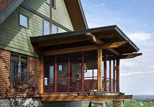 Exterior, vertical, rear elevation with screened porch, Sparta, North Carolina; Blue Ridge Timberwrights