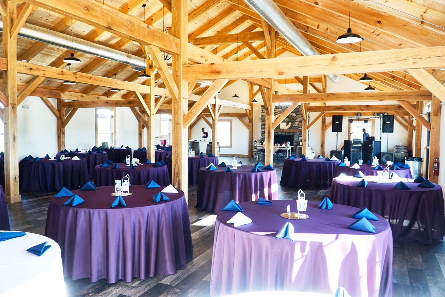 Decorated tables blue table cloths and nakpins - Fox Meadow Barn Blue Ridge Timberwrights Event Venues Gallery