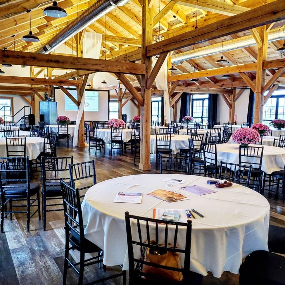 Decorated tables in the reception hall - Fox Meadow Barn Blue Ridge Timberwrights Event Venues Gallery