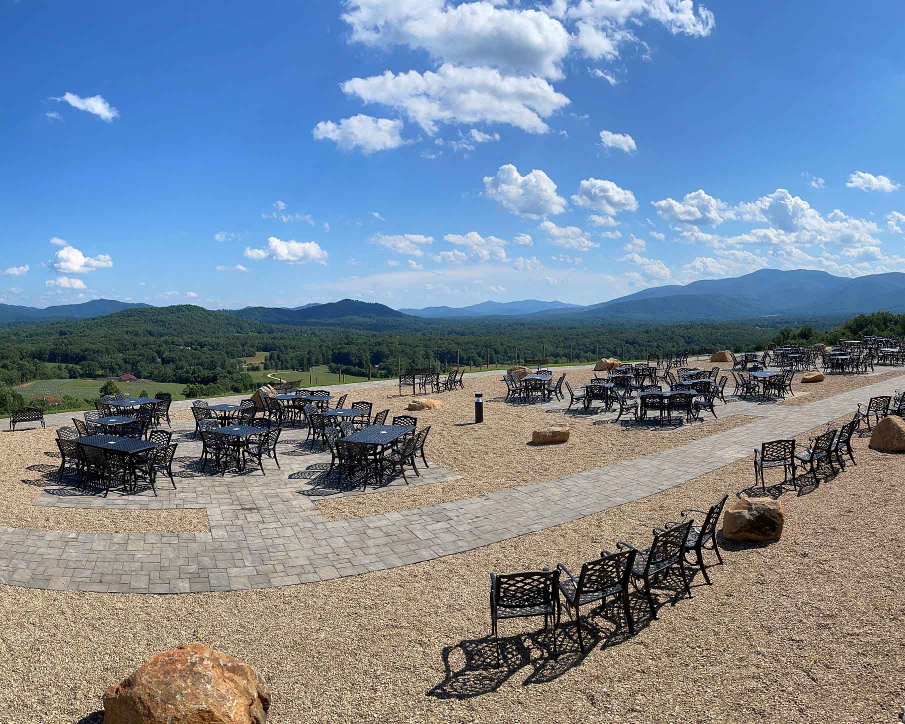 Iron tables & chairs overlooking hills, Hazy Mountain Vineyards - Blue Ridge Timberwrights Event Venues Gallery